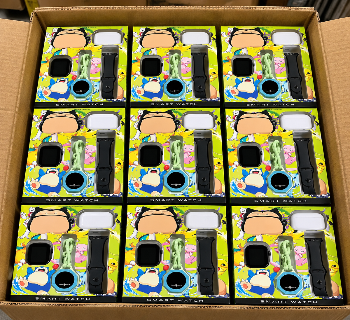 Carton revendeur de coffret contenant une montre connectée, des écouteurs, et un chronomètre de cou